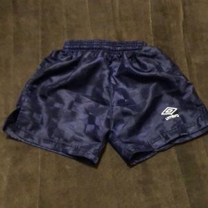 Umbro Youth Checkerboard Soccer Shorts. Deep Purple. Woven material. Size: YS.